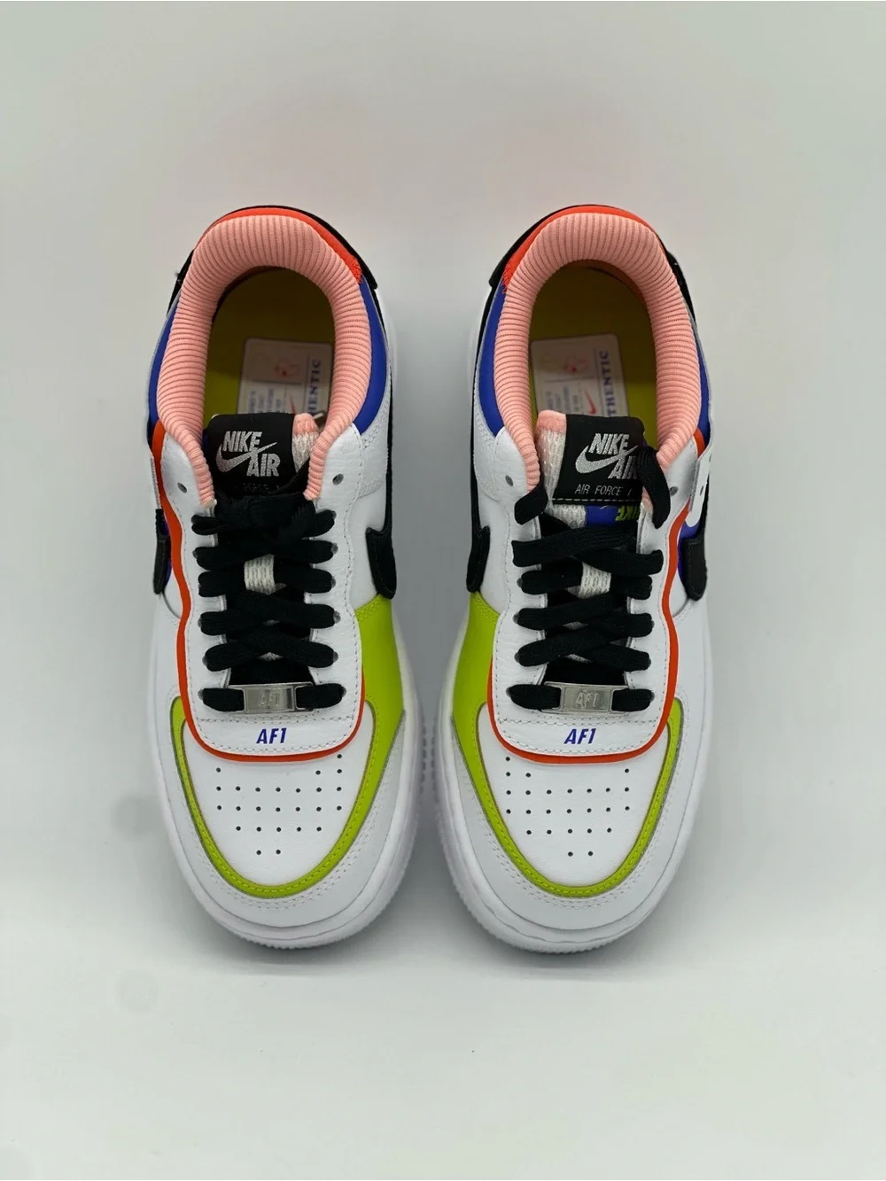 Nike Women's White Sneakers with Black, Neon Green & Pink Accents